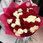 A Bouquet of 50 Red and White Roses in Luxury Packaging